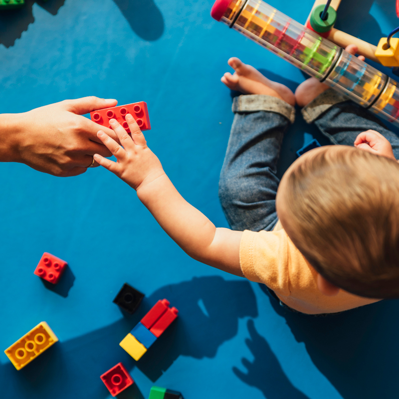 Baby boy playing with blocks