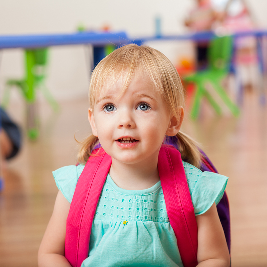 preschool girl with backpack