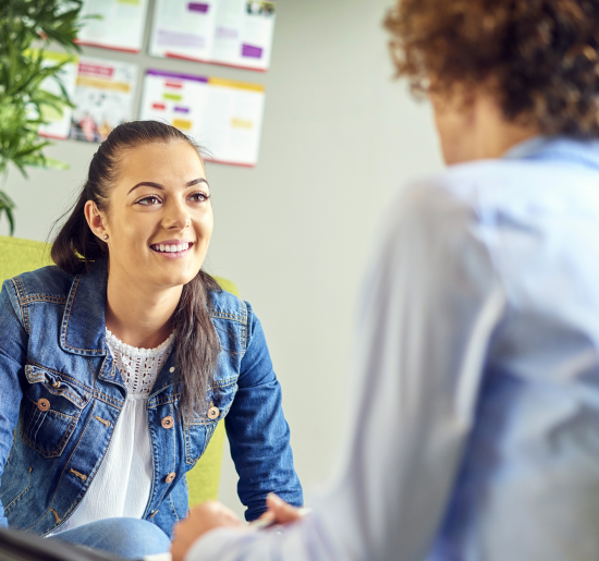 college student speaking with an advisor