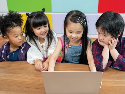 A group of children in the US read a digital storybook.