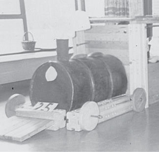 Children build a train from the Patty Smith Hill blocks.