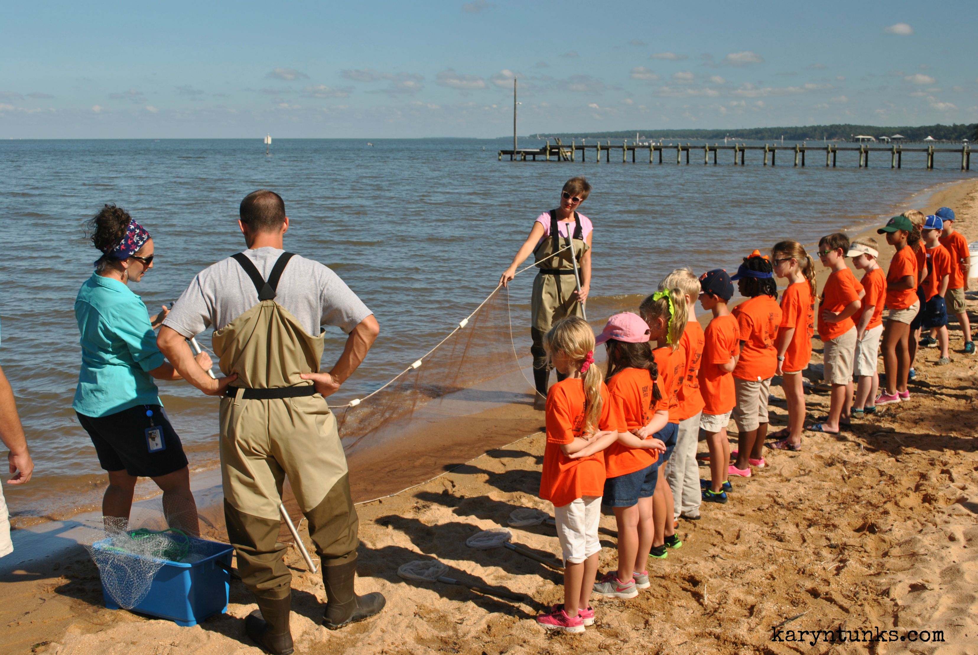 Ms. Hardman explains how the seine net is used to collect fish.