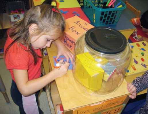 Child writing on poster