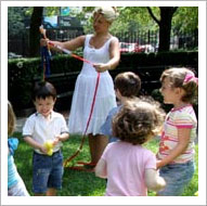 Teacher playing rope game with students