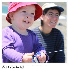 Toddler flying kite