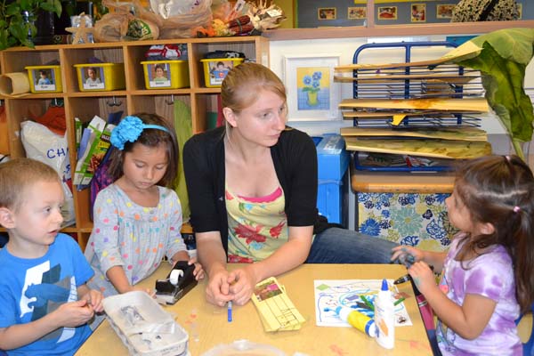 Teacher explaining bullying to students