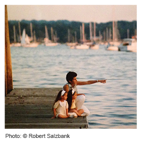 Father with kids on dock