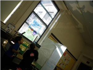 Kids playing with shadows on ceiling