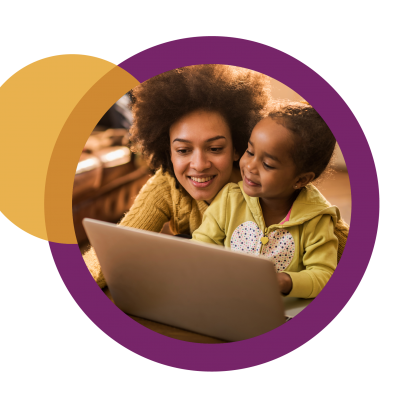mother and daughter on computer