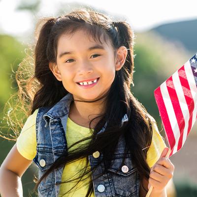 young girl with american flag