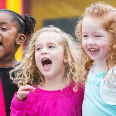 Group of preschoolers singing.