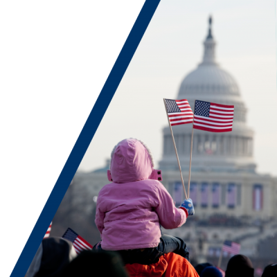 child waving flag infront of the US capitol building