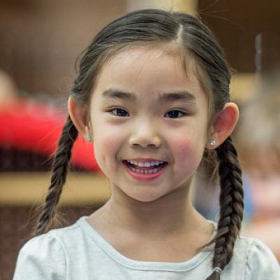 Girl smiling in classroom