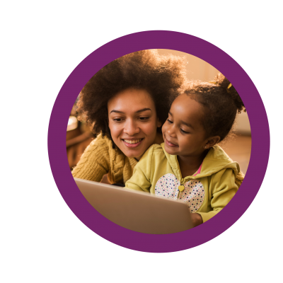 mother and young daughter using a computer