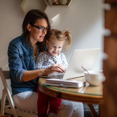 mother and daughter on laptop
