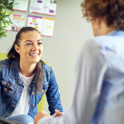 college student speaking with an advisor