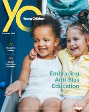 Cover of the November issue of YC, featuring two girls hugging