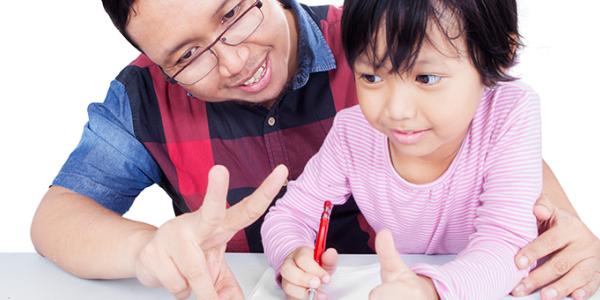 Father and daughter engaging in learning