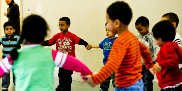 Children holding hands in a circle