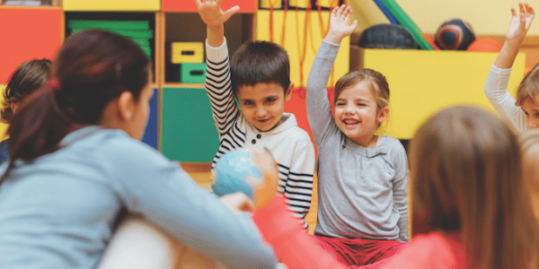 Preschool children in circle in classroom