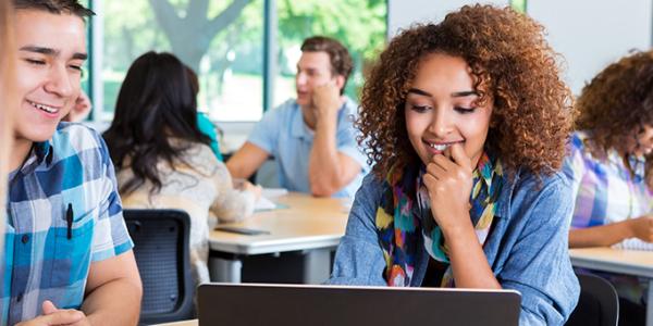 Young Professionals looking at computer screen