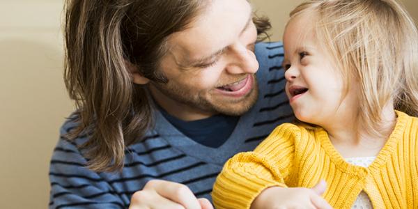 Father and daughter laughing