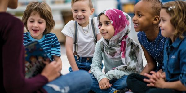 Children gathered on the carpet during storytime