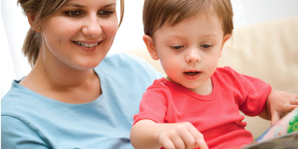 Mom reading a book with her toddler