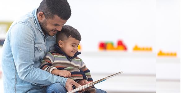 A parent reading with a child.