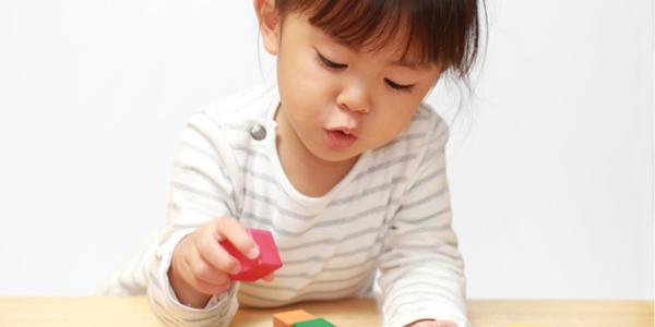 child with blocks