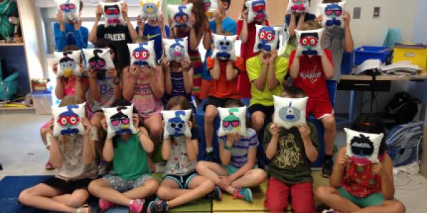 A class holding up pillows