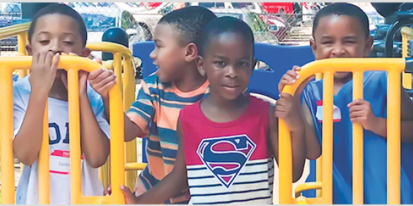 Four boys on playground