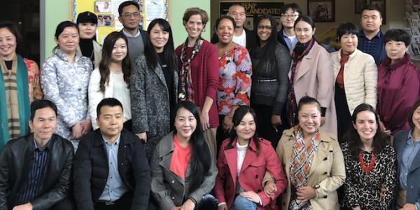Cotrainers Dr. Nili Luo and Dr. Lea Ann Christenson with a group of teachers, directors, and investors from China