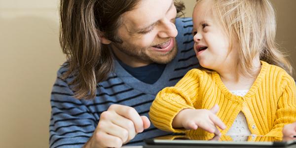 Father and daughter laughing