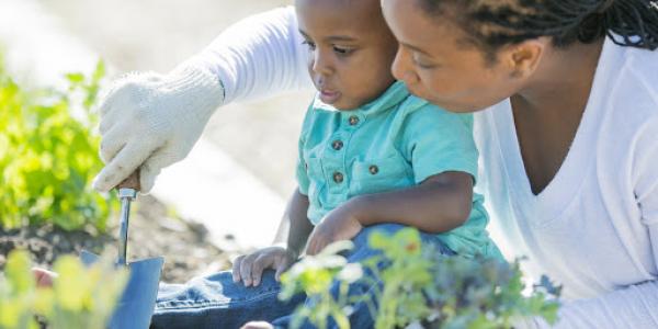 Mother and toddler in the garden