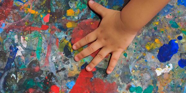 A child playing with paint