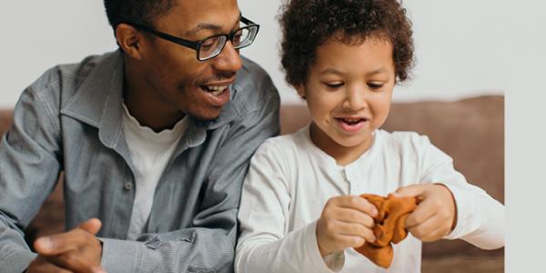 Father and child working together