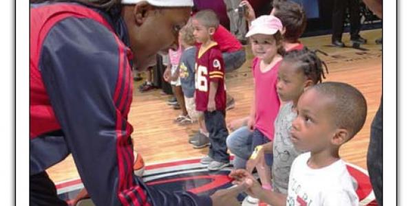 Children meeting WNBA players