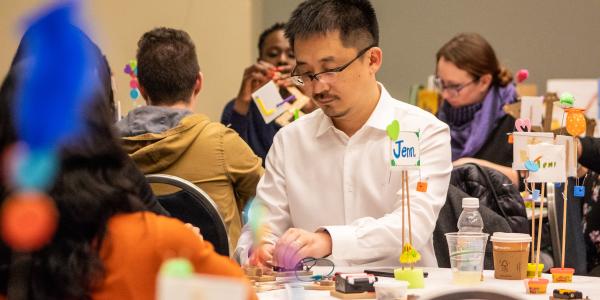 NAEYC Annual Conference attendees learning to make and tinker in a pre-conference workshop. 