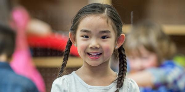 Girl smiles at camera