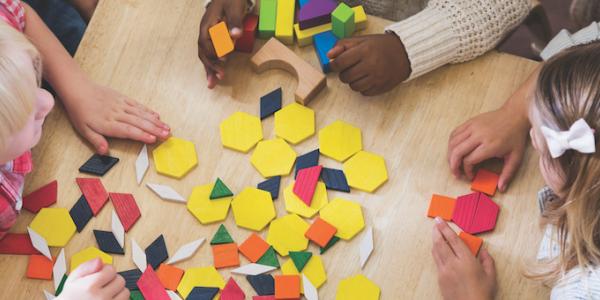 Children playing with shapes