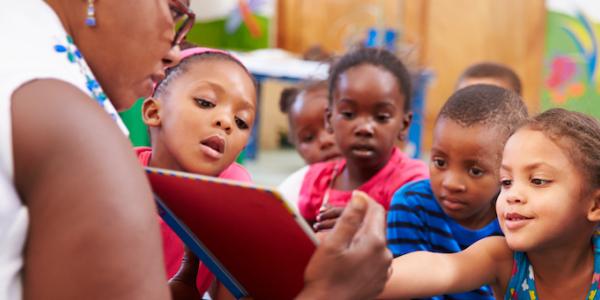 Children reading in a circle