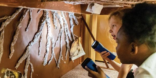 some children exploring a craft fort