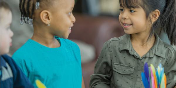 two children looking at each other