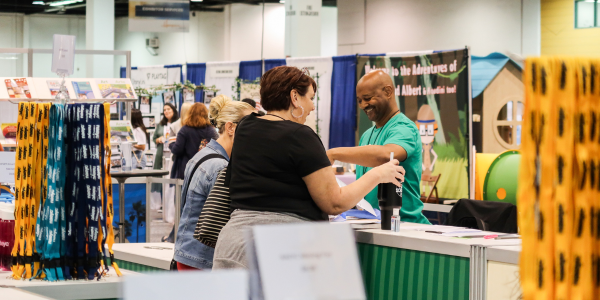 Members at the annual conference expo