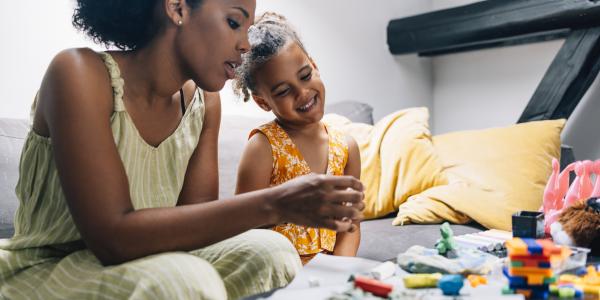 Mother working on crafts with her daughter
