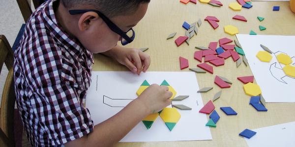 Child playing with materials