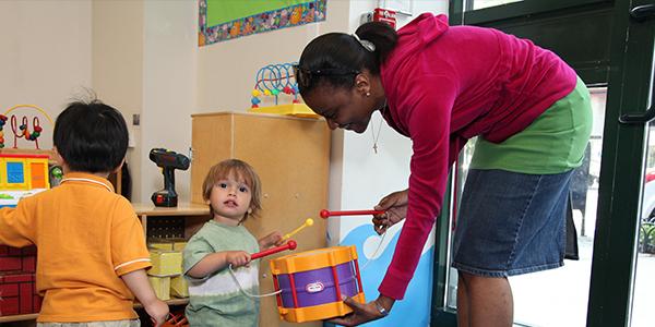 teacher drumming with students