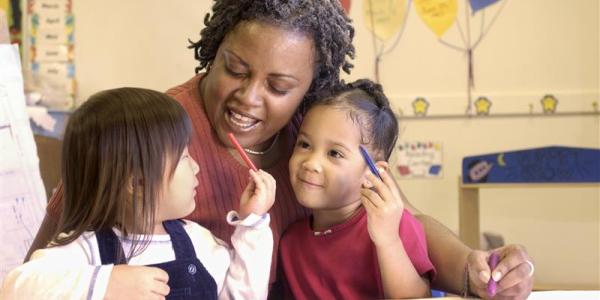 A teacher working with young children