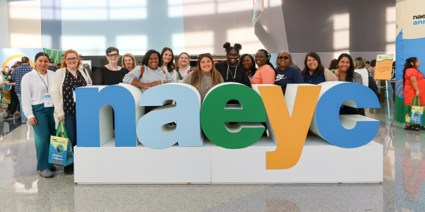 Attendees posing with NAEYC blog letters